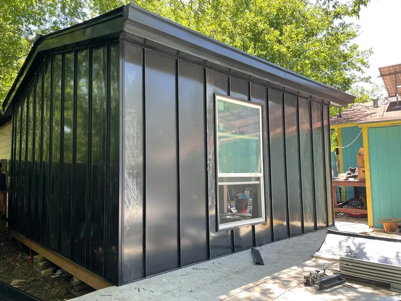 Black standing seam metal wall panels for Roof Inspection in Shelbyville